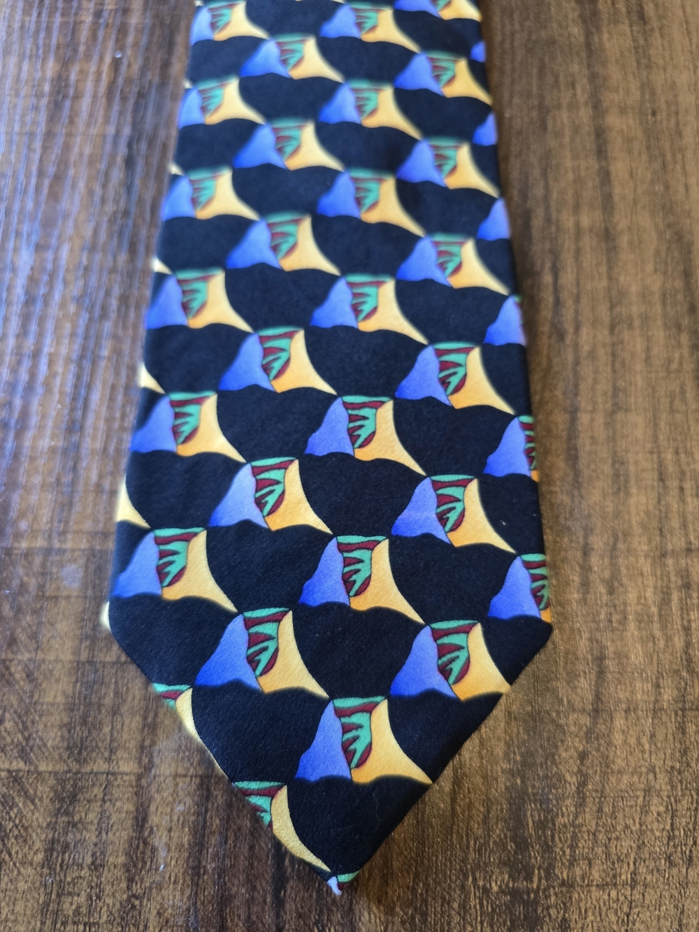 J. Garcia Black Tie with Blue, Gold and Green Geometric Motif - Stonehenge Ltd.